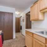 Photo of cabinets in a model apartment kitchen